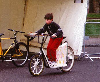 Some kid on a strange bike